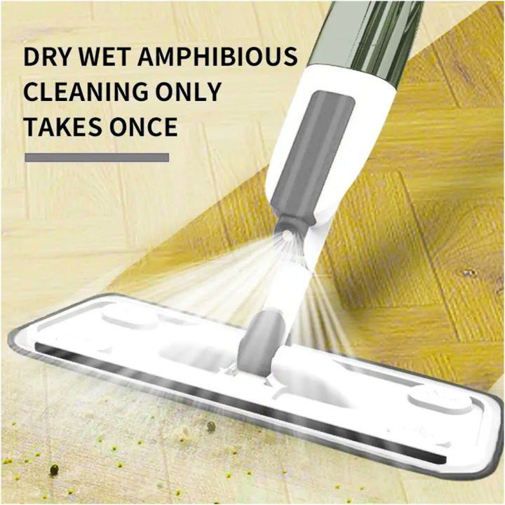 Spray mop with refillable bottle spraying fine mist on the floor
