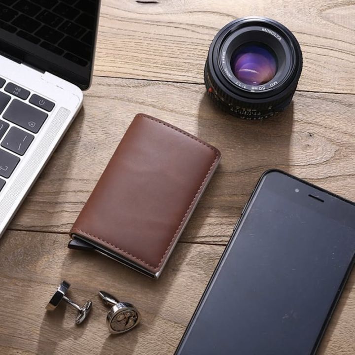 Metal wallet with pop-up card mechanism