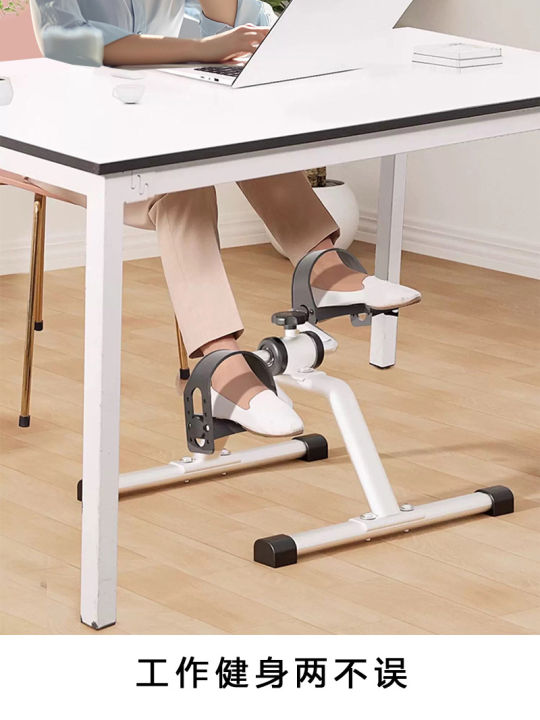 Close-up of pedal exerciser strap pedals and tubular steel frame