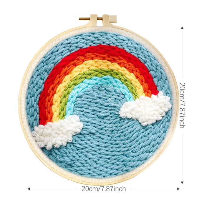 Punch needle embroidery kit contents with colorful yarns