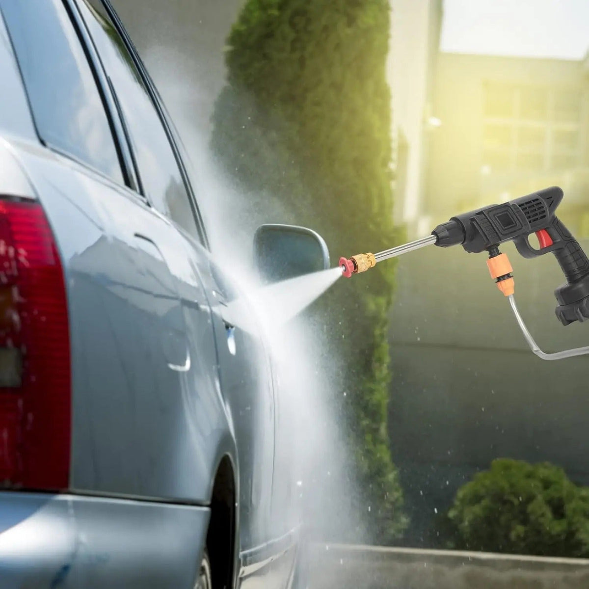 Pressure washer cleaning car